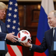 Putin gives Trump a soccer ball at a conference in Helsinki, Finland this week.